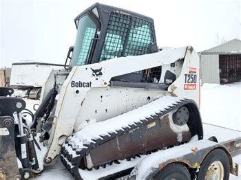 used skid steer attachments saskatchewan|used skid steer saskatchewan.